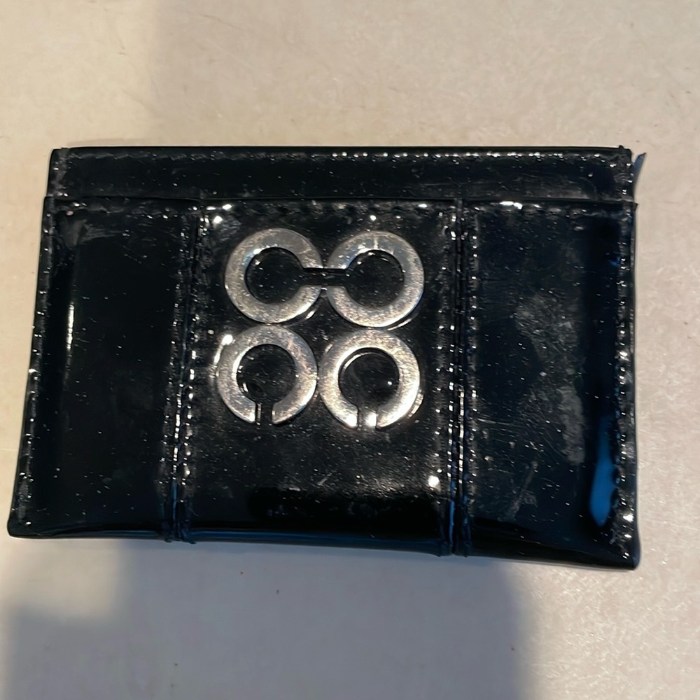 COACH black, patent leather, credit card, or business card holder.
